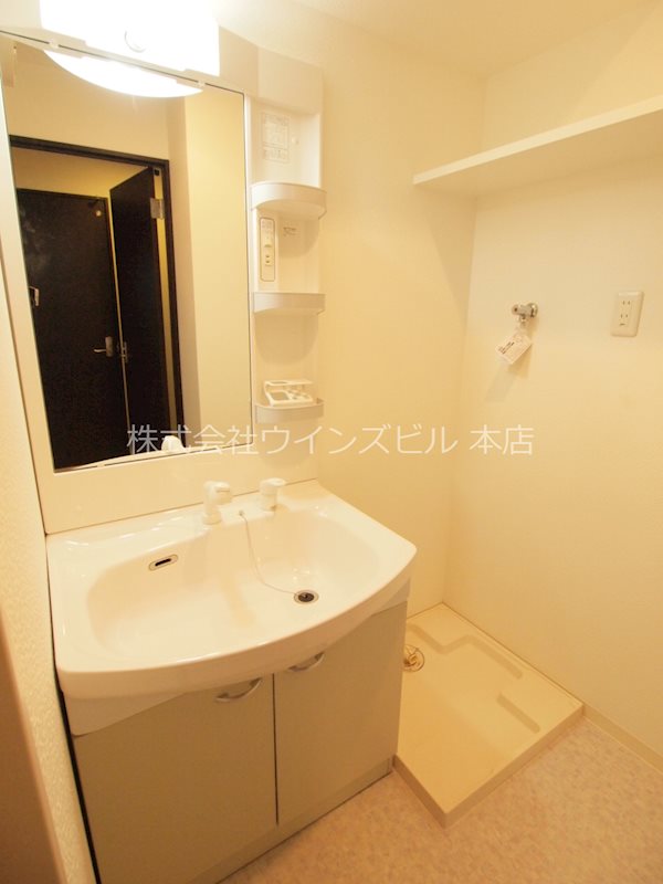 洗面所：室内洗濯機置き場.洗面所。